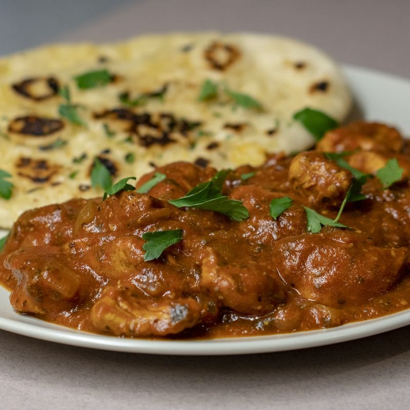 Butter Chicken — pollo tandoor en salsa cremosa de tomate y mantequilla